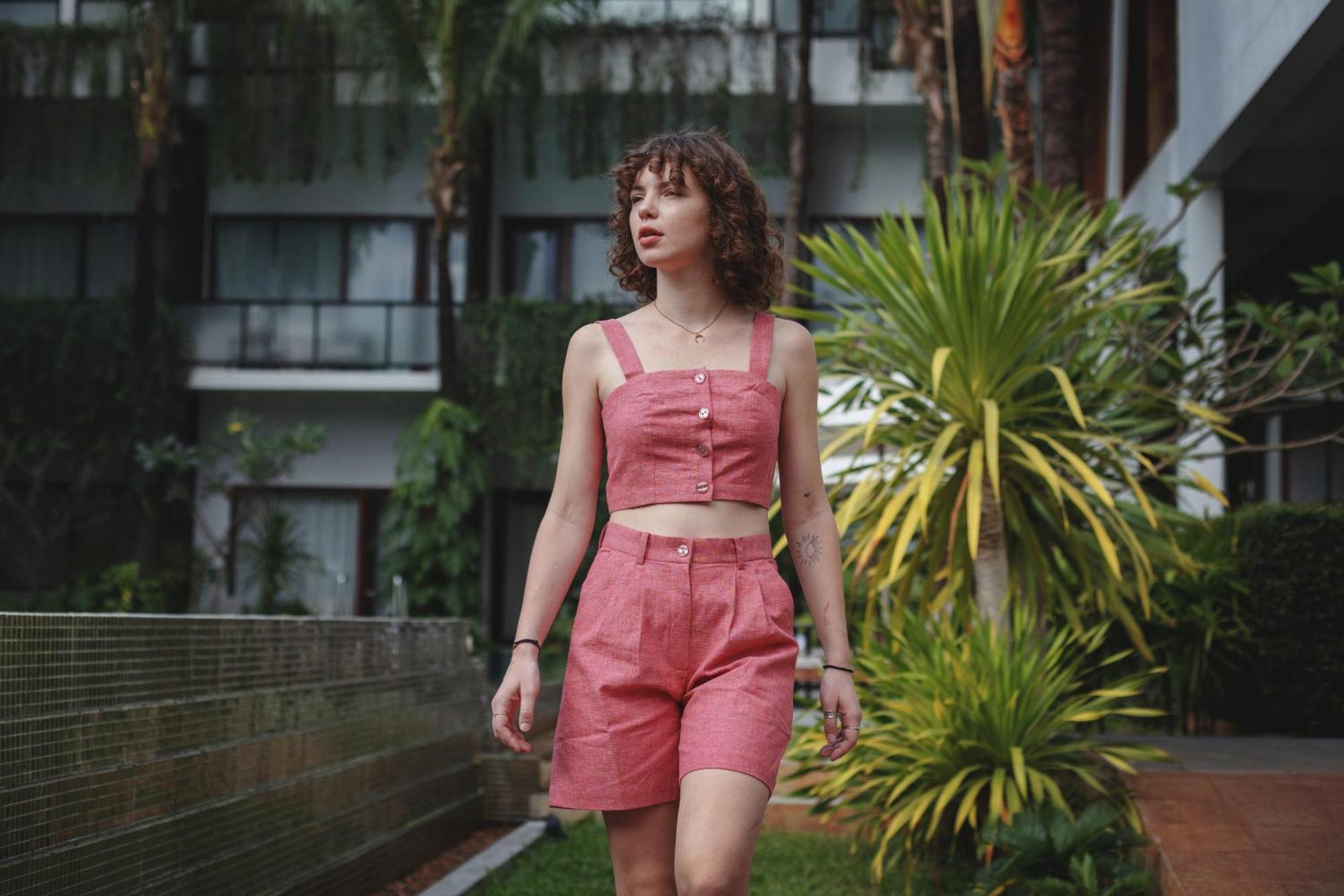 Shintana Saya La Maison Сиемрип Экстерьер фото A woman wearing a crop top